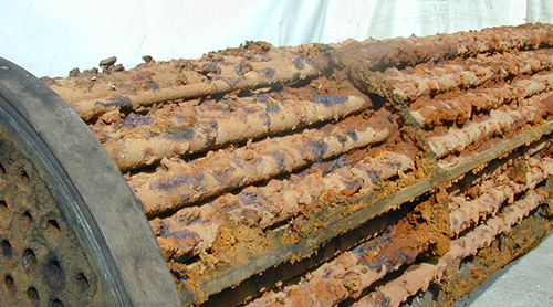 تجمع رسوب روی سطح کوئل منبع کویلدار تجمع رسوب روی سطح کوئل منبع کویلدار